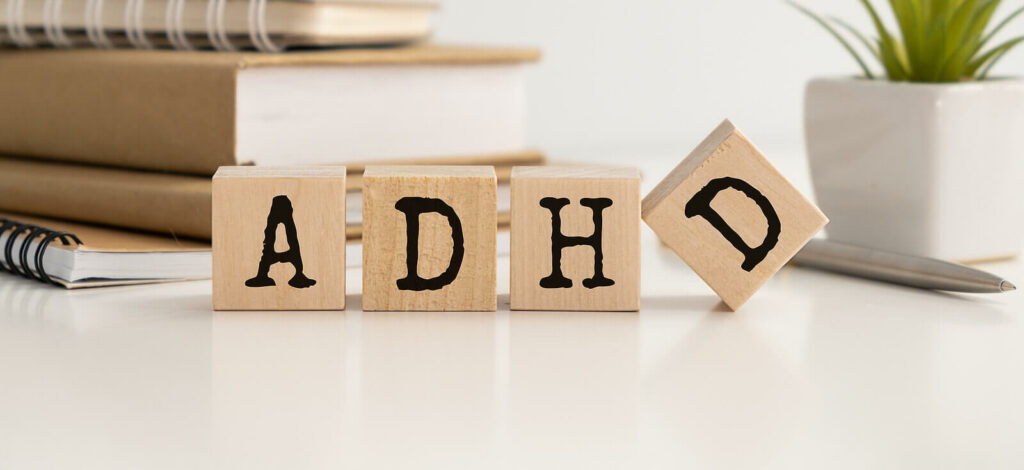 ADHD Blocks - ADHD-Focused Therapy in NYC - ADHD-Focused Therapy for Anxiety - ADHD-Focused Therapy for Depression in NYC - 10018 - 10010 - 10003 - 10011 - 10012 Wooden cube blocks sitting on a desk that spell out ADHD. ADHD does not have to be a negative diagnosis. Learn to unlock its superpowers with ADHD-Focused Therapy in NYC.